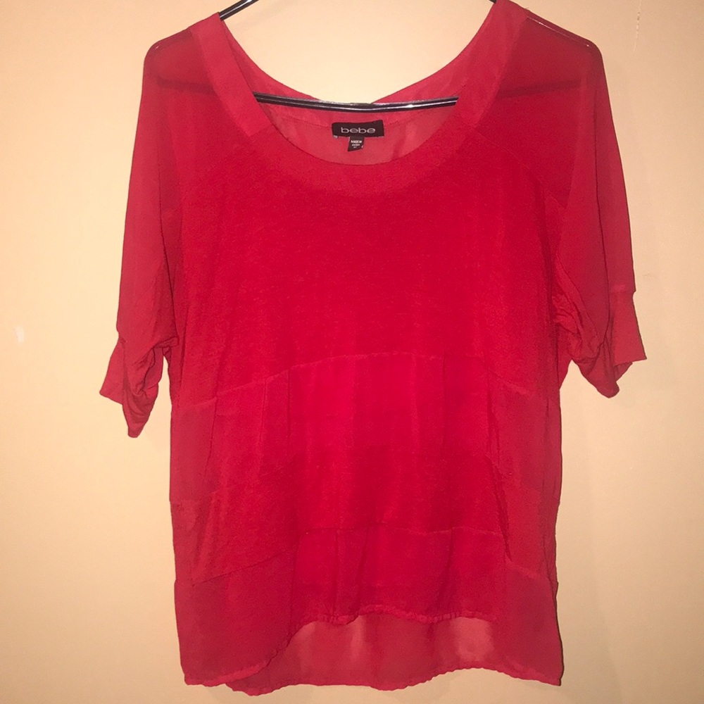 Red BEBE top with sheer stripes